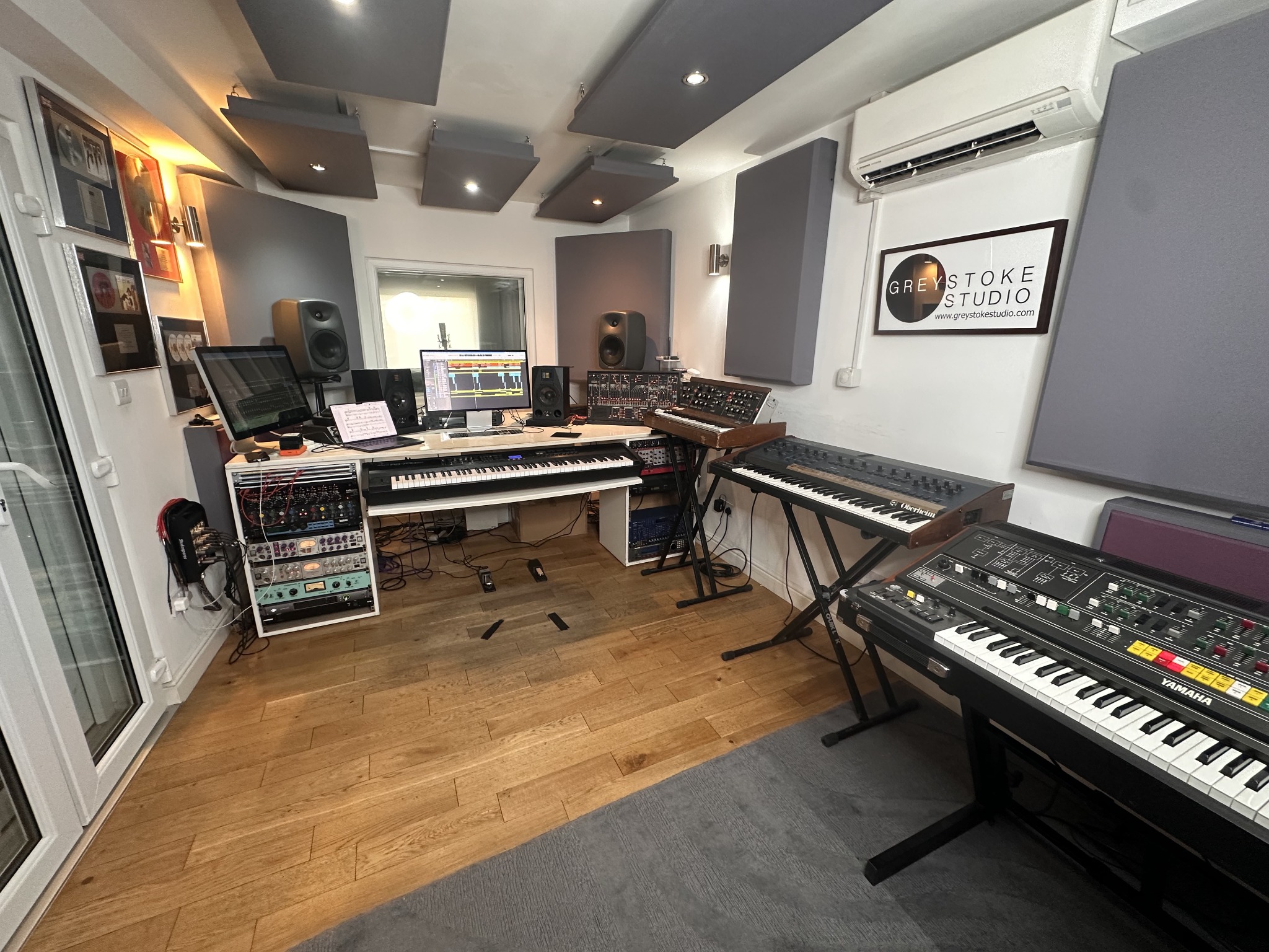 Greystoke Studio control room, recording workstation, monitors and vintage keyboards